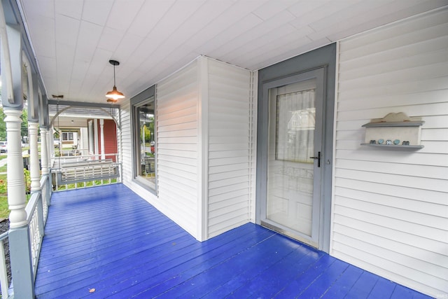 wooden deck featuring a porch