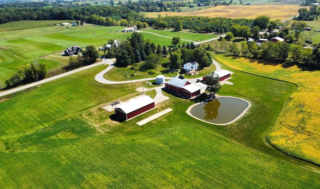 birds eye view of property featuring a rural view