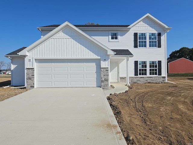 view of front of property with a garage