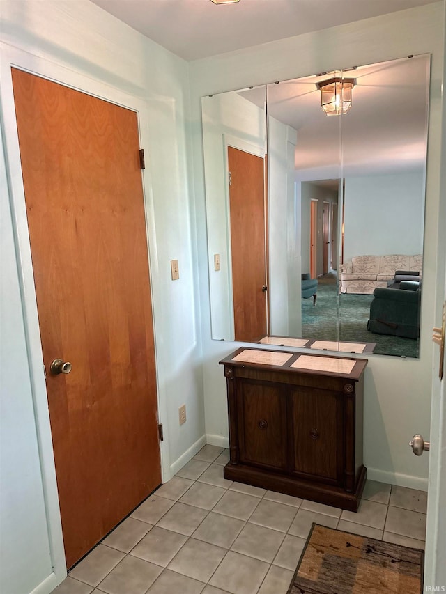 bathroom with tile patterned floors