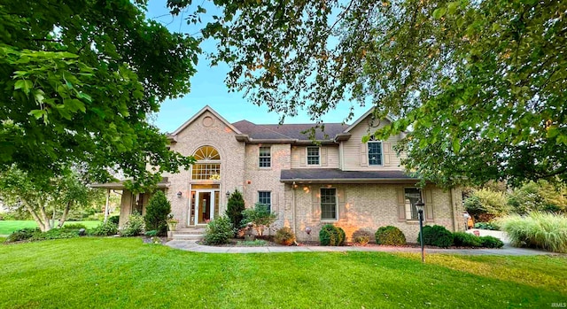 view of front of home with a front yard