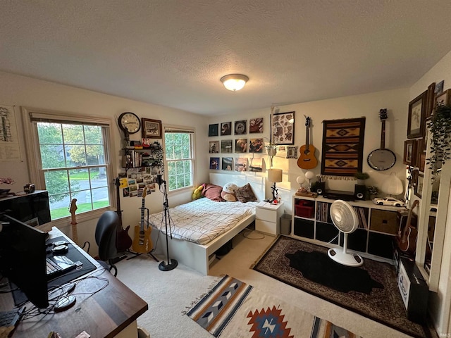 bedroom featuring a textured ceiling