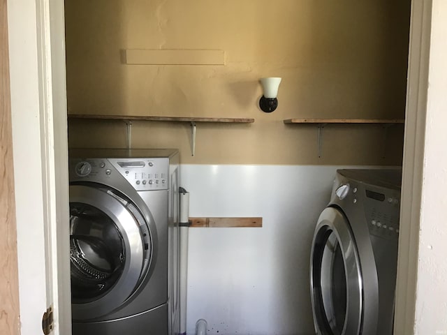 laundry area with washer / dryer