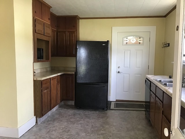 406 W 750 S, Star City, IN 46985 - kitchen featuring freestanding refrigerator, crown molding, light countertops, dishwasher, and baseboards
