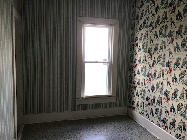 406 W 750 S, Star City, IN 46985 - empty room featuring wallpapered walls and baseboards