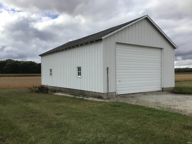 garage with a lawn