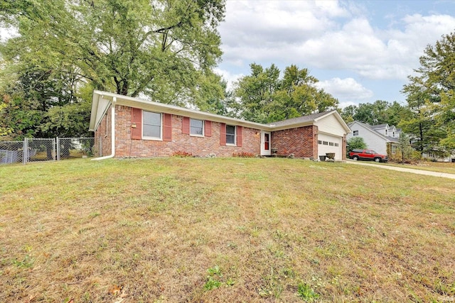 ranch-style house with a front lawn and a garage