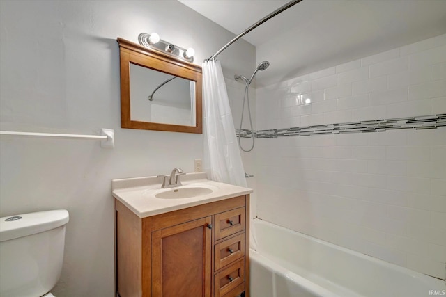 full bathroom with shower / bath combination with curtain, vanity, and toilet