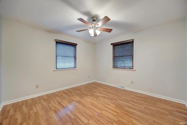 unfurnished room with light hardwood / wood-style floors and ceiling fan