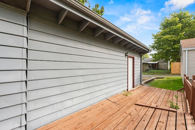 deck featuring a lawn