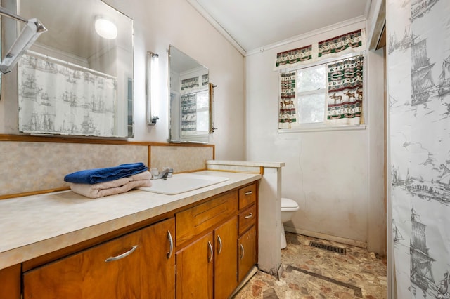 bathroom with ornamental molding, toilet, decorative backsplash, vanity, and a shower with shower curtain