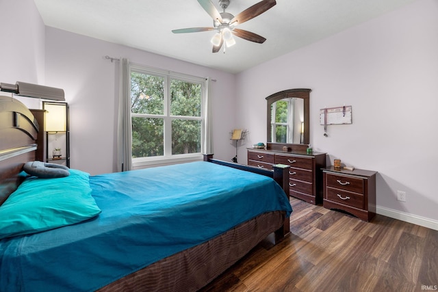 bedroom featuring dark wood-type flooring and ceiling fan