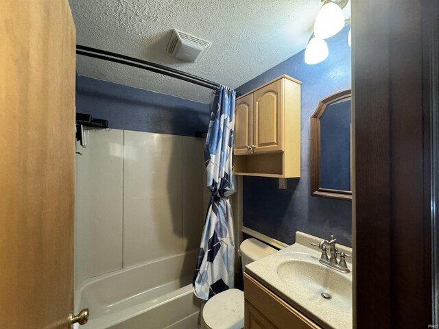 232 S Main St, Avilla, IN 46710 - full bathroom with a textured ceiling, visible vents, toilet, vanity, and shower / tub combo with curtain