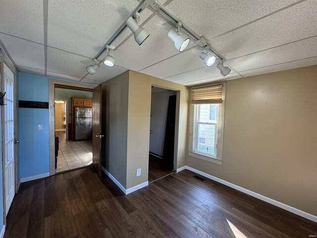 232 S Main St, Avilla, IN 46710 - interior space featuring visible vents, baseboards, and wood finished floors