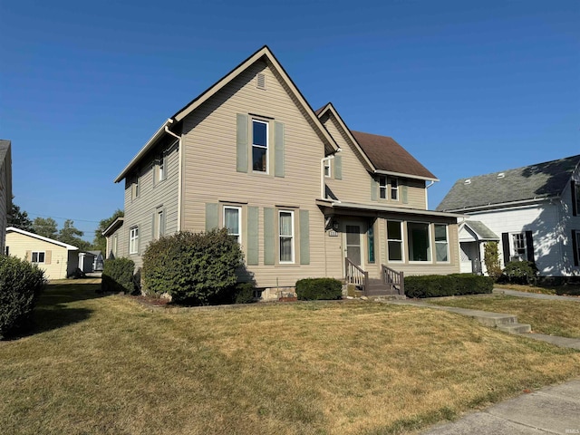 front of property featuring a front lawn