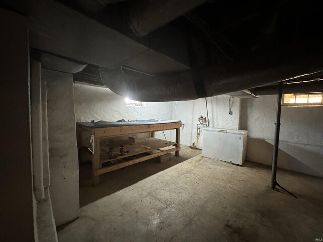 232 S Main St, Avilla, IN 46710 - below grade area featuring refrigerator