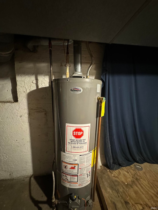 utility room with water heater