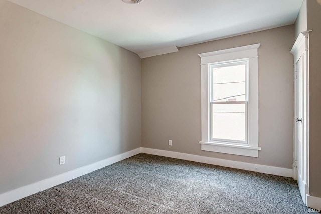 empty room featuring carpet flooring