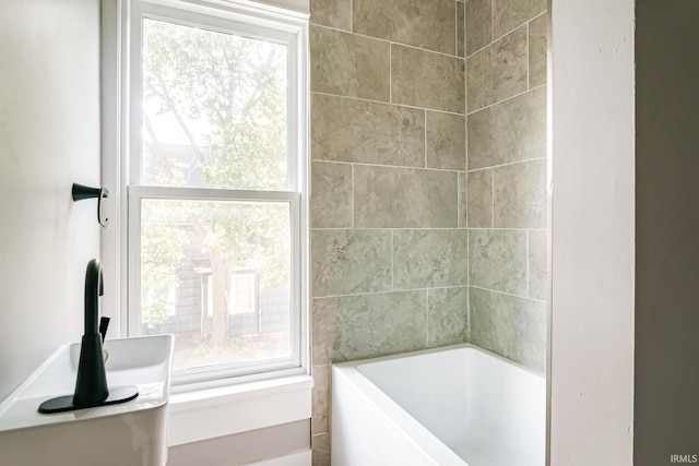 bathroom with a washtub