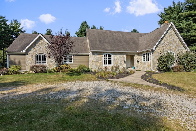 view of front of home with a front lawn