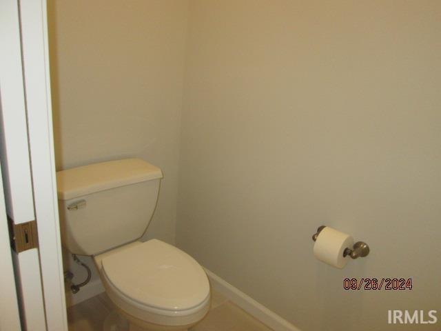 2159 Maple Leaf Dr, Kokomo, IN 46902 - bathroom featuring toilet and baseboards