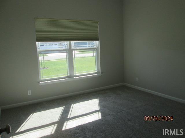 2159 Maple Leaf Dr, Kokomo, IN 46902 - empty room featuring carpet floors and baseboards