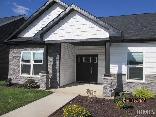 2159 Maple Leaf Dr, Kokomo, IN 46902 - doorway to property featuring stone siding