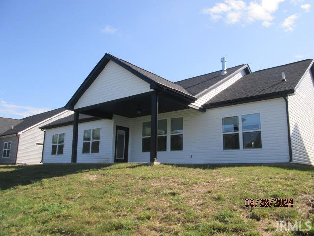 2159 Maple Leaf Dr, Kokomo, IN 46902 - rear view of property featuring a yard
