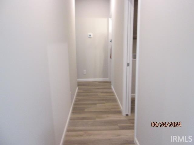 hallway featuring light hardwood / wood-style floors