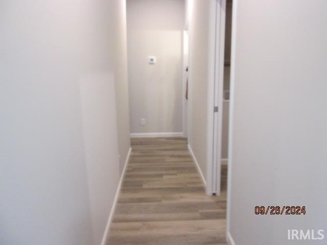2159 Maple Leaf Dr, Kokomo, IN 46902 - corridor featuring light wood-style flooring and baseboards
