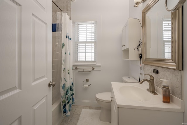 full bathroom featuring tasteful backsplash, shower / bath combo, toilet, vanity, and tile patterned flooring