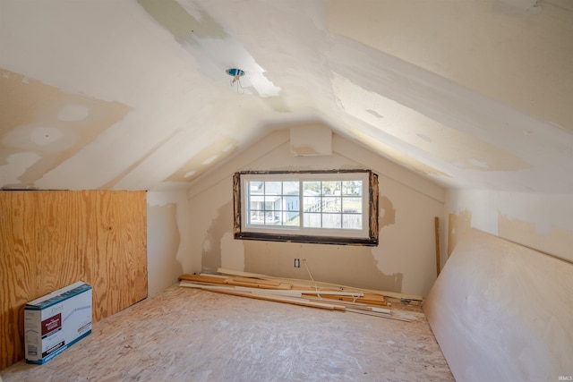 bonus room featuring lofted ceiling