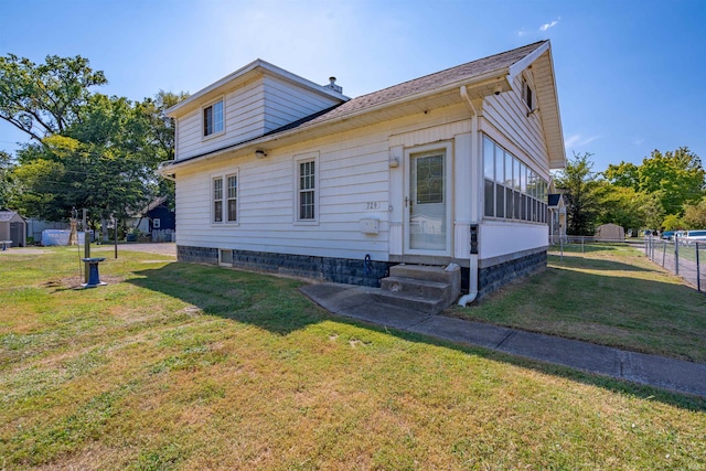 exterior space with a lawn