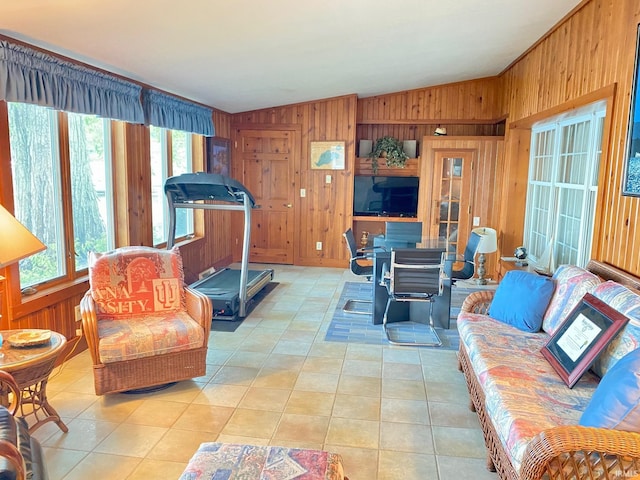 tiled living room with vaulted ceiling and wood walls