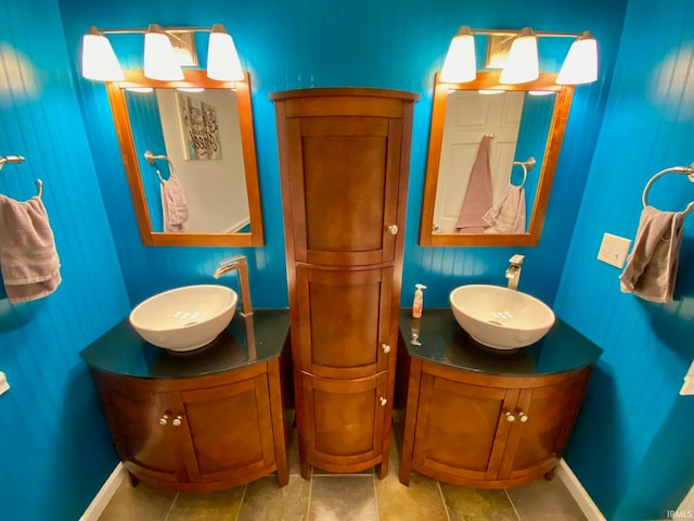 bathroom featuring tile patterned floors and vanity