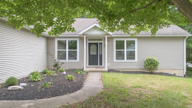 view of front of house featuring a front lawn