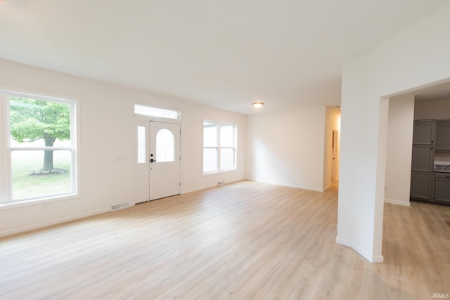 entrance foyer with light wood-type flooring