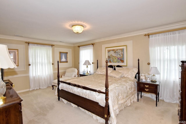 bedroom with light carpet and crown molding