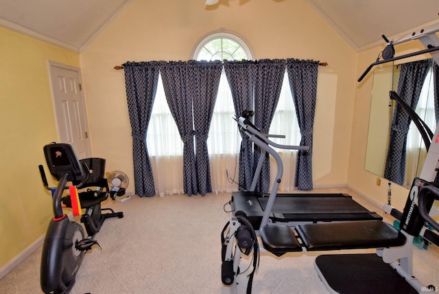 workout room with ornamental molding, carpet flooring, and vaulted ceiling