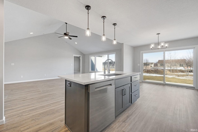 602 Zion Hill Rd, Ligonier, IN 46767 - kitchen featuring light wood finished floors, a sink, stainless steel dishwasher, and open floor plan