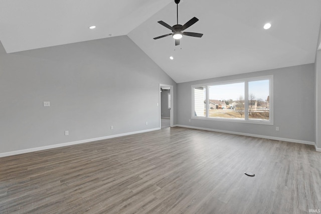 602 Zion Hill Rd, Ligonier, IN 46767 - interior space featuring recessed lighting, high vaulted ceiling, baseboards, a ceiling fan, and wood finished floors