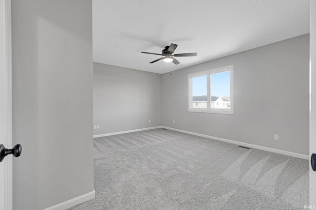 602 Zion Hill Rd, Ligonier, IN 46767 - unfurnished room with visible vents, carpet, baseboards, and ceiling fan