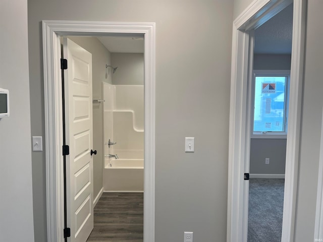 bathroom featuring washtub / shower combination