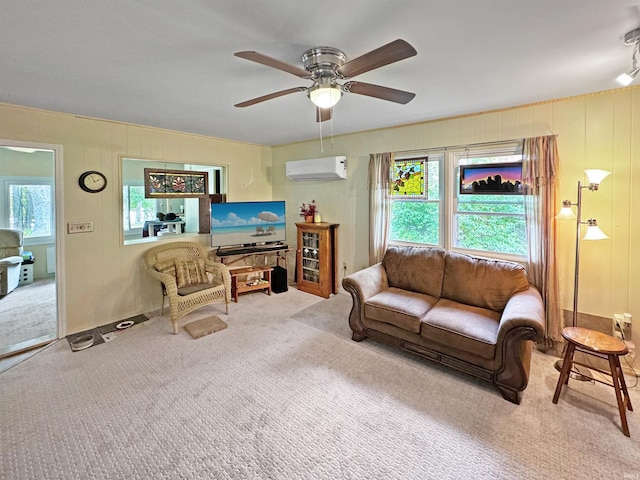 carpeted living room with plenty of natural light, ceiling fan, and a wall unit AC