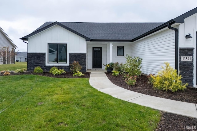 view of front of home with a front lawn