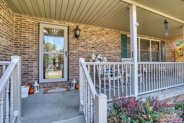 property entrance with a porch