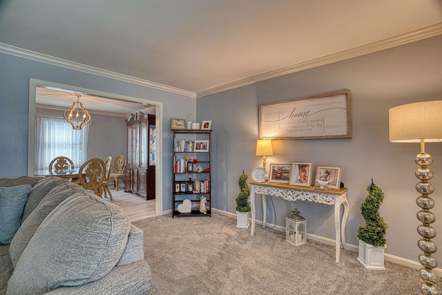 interior space featuring carpet, ornamental molding, and a notable chandelier