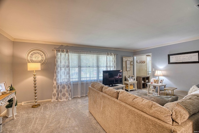 carpeted living room with ornamental molding