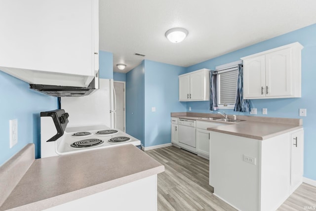 kitchen featuring light wood-type flooring, sink, white cabinets, range with electric cooktop, and white dishwasher