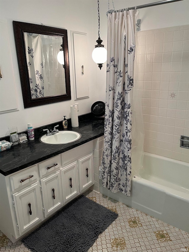 bathroom featuring vanity, shower / bath combo, and tile patterned flooring